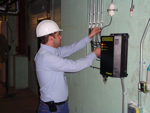 Dan House Electric installing a commercial fire-alarm / monitoring system